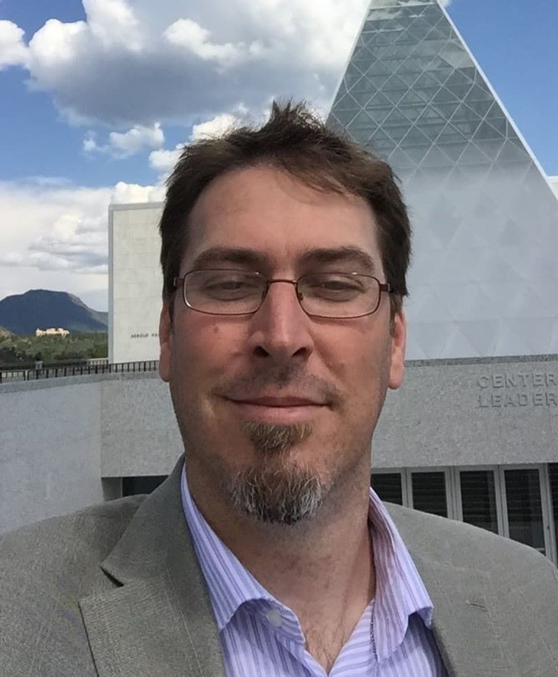 Jeremy Mappus in front of the Air Force Academy Center for Leadership